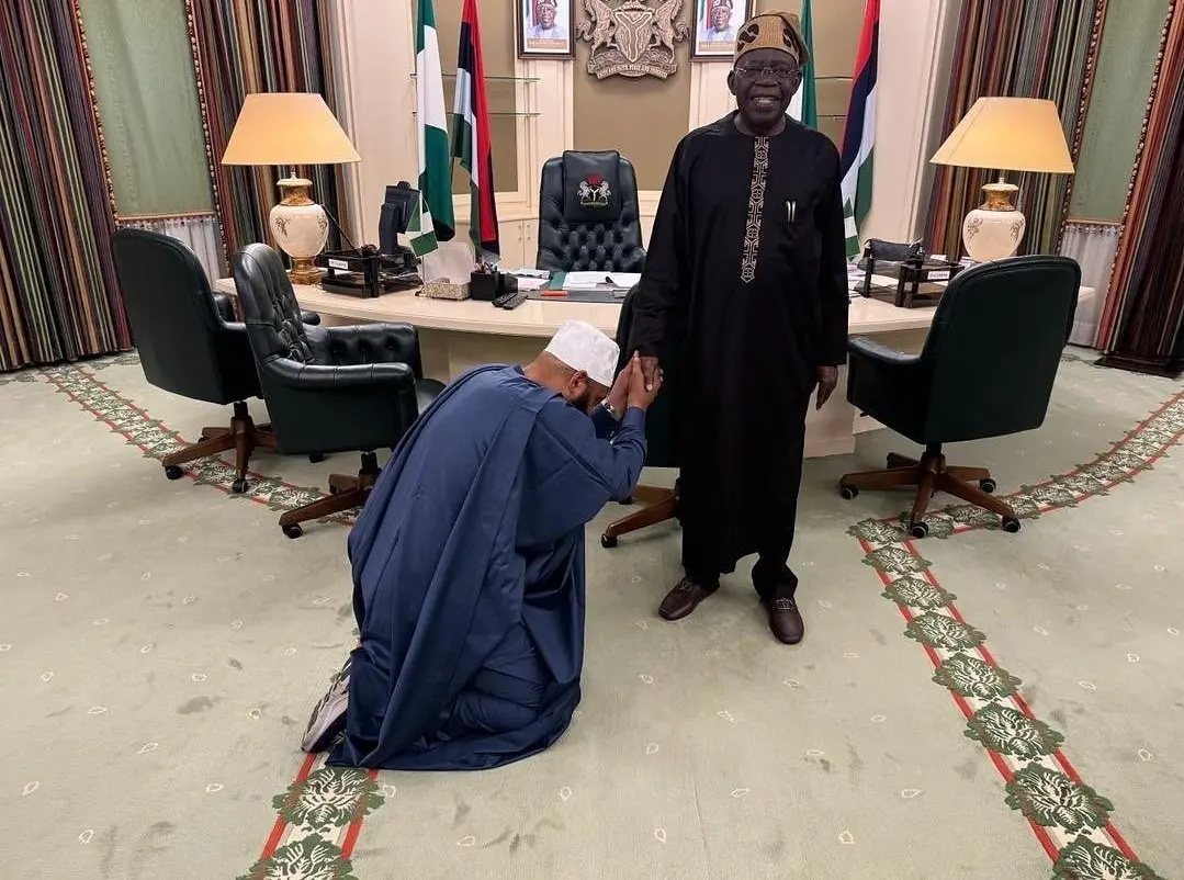 Gov Bago visits, kneels before Tinubu